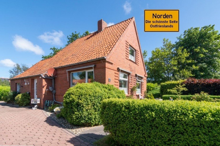 7803 Titelbild mit Ortsschild Einfamilienhaus Norden