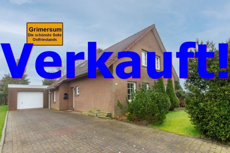 7889 Titelbild mit Ortsschild verkauft Krummh�rn / Grimersum Einfamilienhaus Gro�z�giges Einfamilienhaus mit massiver Garage in zentraler Lage der Krummh�rn OT Grimersum!