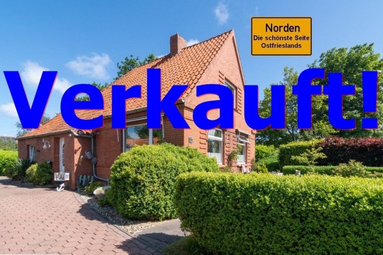 7803 Titelbild mit Ortsschild verkauft Norden Einfamilienhaus Solides Wohnhaus mit Einliegerwohnung und Wohlf�hlgrundst�ck am westlichen Stadtrand von Norden!