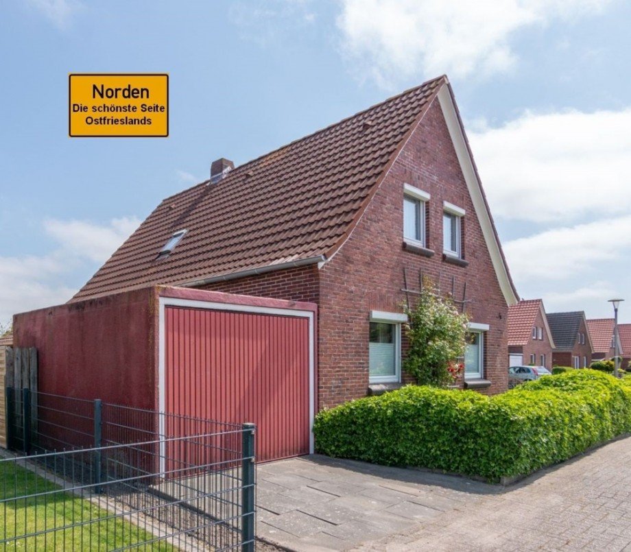 7849 Titelbild mit Ortsschild Einfamilienhaus Norden
