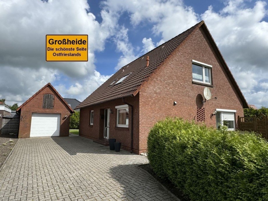 7875 Titelbild mit Ortsschild Einfamilienhaus Gro�heide