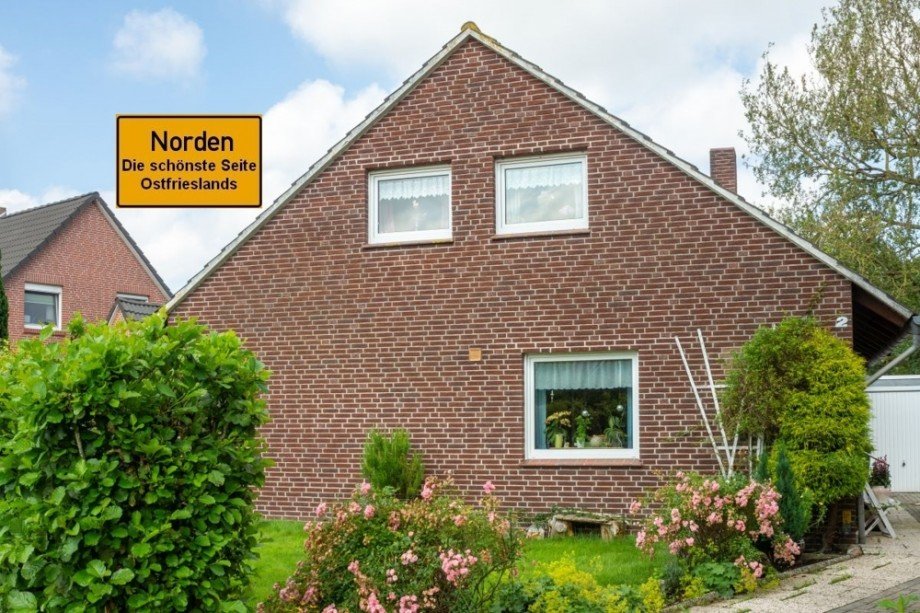 7904 Titelbild mit Ortsschild Einfamilienhaus Norden