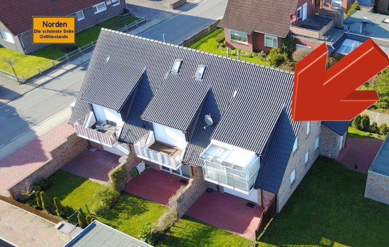 7998 Titelbild mit Pfeil und Ortsschild Norden Etagenwohnung Luxuri�se Zwei-Zimmer-Wohnung mit Wintergarten und vielen Extras in sehr beliebter Lage von Norden!