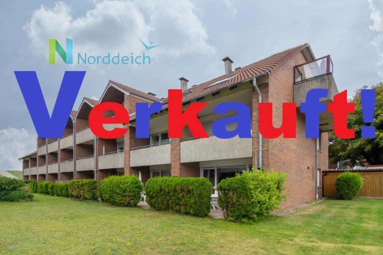 7951 Titelbild mit Ortsschild verkauft Norden Erdgeschosswohnung Hinterm Deich ist�s am sch�nsten! Ansprechende Erdgeschoss-Ferienwohnung in Norddeich !