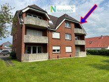 7848 Titelbild mit Ortsschild Nur etwa 550 Meter bis zum Nordseedeich! Sch�n aufgeteilte Ferienwohnung in Best-Lage von Norddeich!
