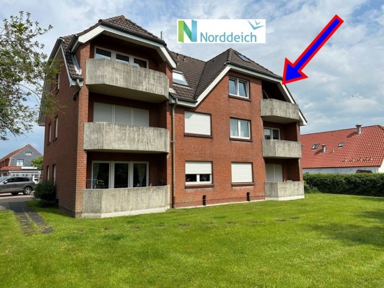 7848 Titelbild mit Ortsschild Norden Dachgeschosswohnung Nur etwa 550 Meter bis zum Nordseedeich! Sch�n aufgeteilte Ferienwohnung in Best-Lage von Norddeich!