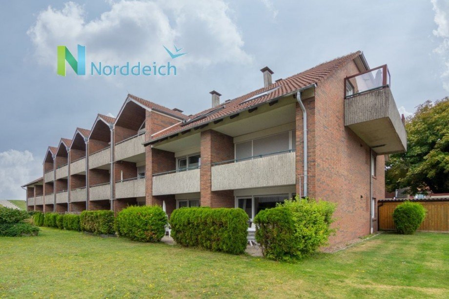7951 Titelbild mit Ortsschild Erdgeschosswohnung Norden