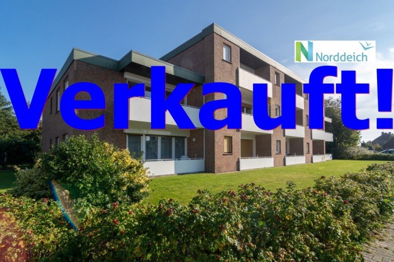 7831 Titelbild mit Ortsschild verkauft Norden Dachgeschosswohnung Gepflegte Ferienwohnung mit Inventar in strand- und deichnaher Lage von Norddeich!
