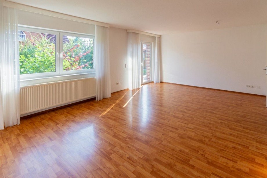 7787 Wohnzimmer Bild I WE I Mehrfamilienhaus Norden