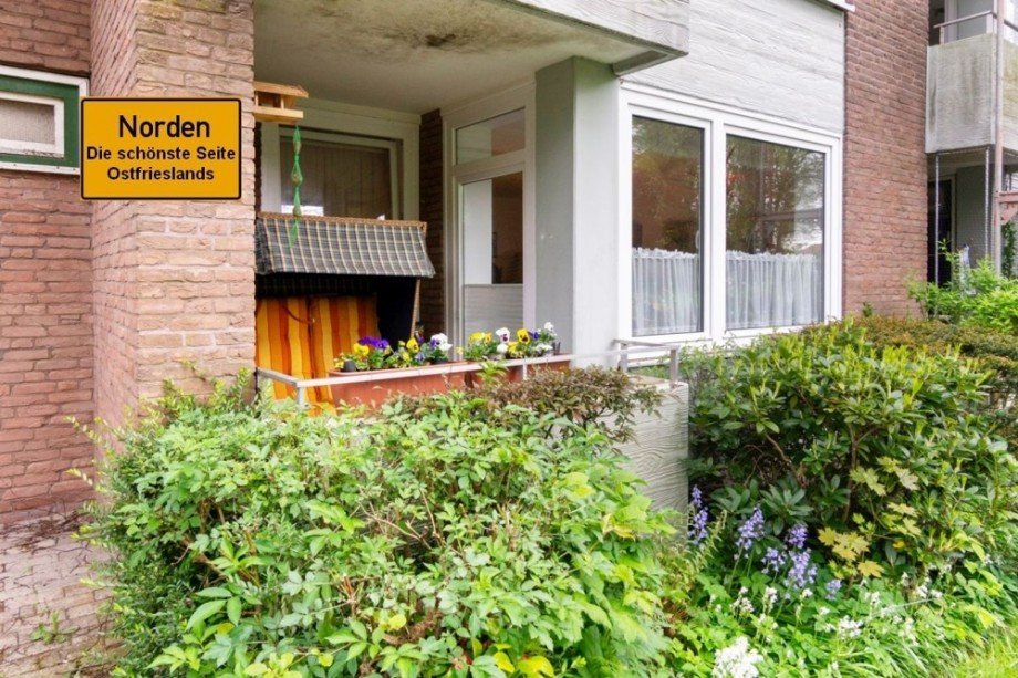 7892 Titelbild m. Ortsschild Erdgeschosswohnung Norden