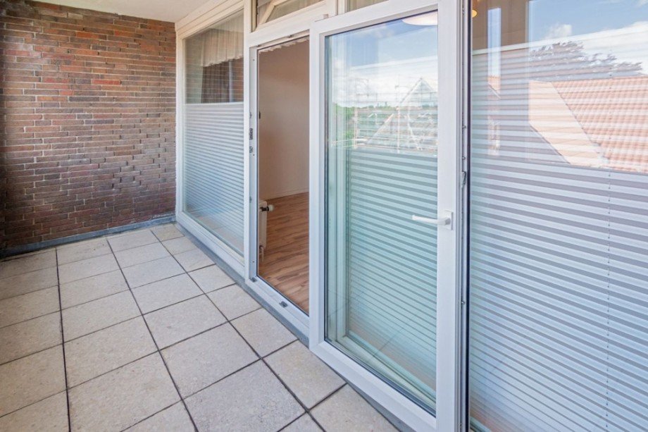 7986 Verglaster Balkon Bild III Etagenwohnung Norden
