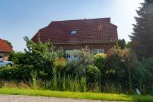 7807 Ansicht von der Stra�e Bezauberndes Einfamilienhaus in Eversmeer mit traumhaft sch�n angelegtem Grundst�ck!