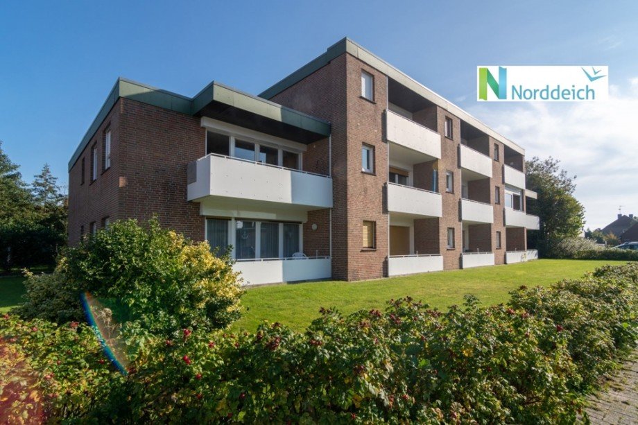 7831 Titelbild mit Ortsschild Dachgeschosswohnung Norden