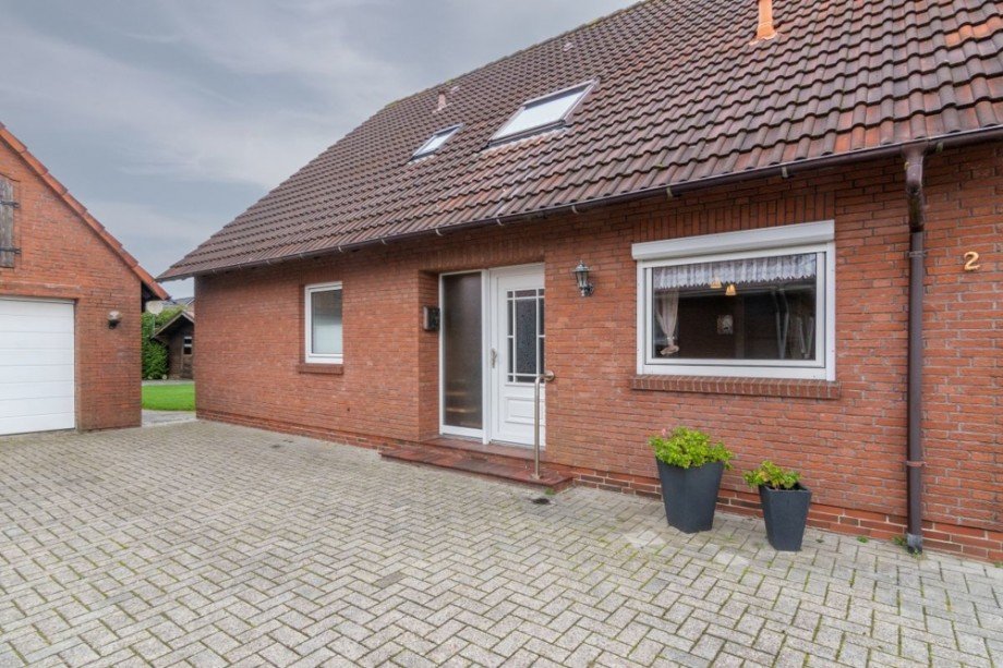 7875 Hausansicht mit Auffahrt Einfamilienhaus Gro�heide