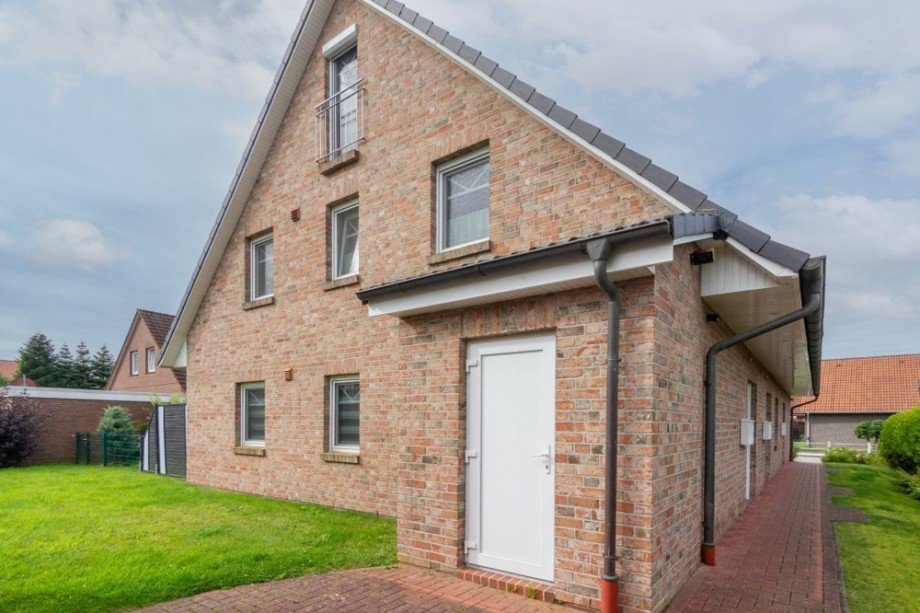 7998 Seitenansicht Haus Etagenwohnung Norden