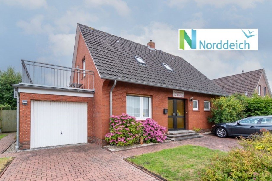 7860 Titelbild mit Ortsschild Einfamilienhaus Norden-Norddeich