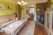 7938 Wohnzimmer Bild III Vornehme Jugenstilvilla als Mansardendachbau mit gelungener Aufteilung in zentraler Lage von Norden
