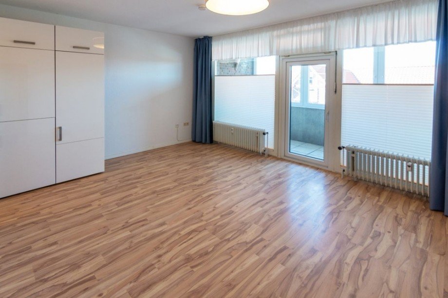 7986 Wohnzimmer Bild I Etagenwohnung Norden